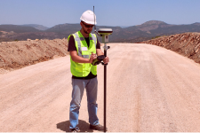 Worker taking GPS readings